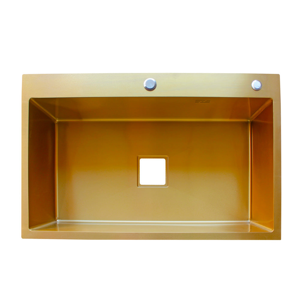 Gold-plated stainless steel sink with  and waste fitting for modern kitchens.